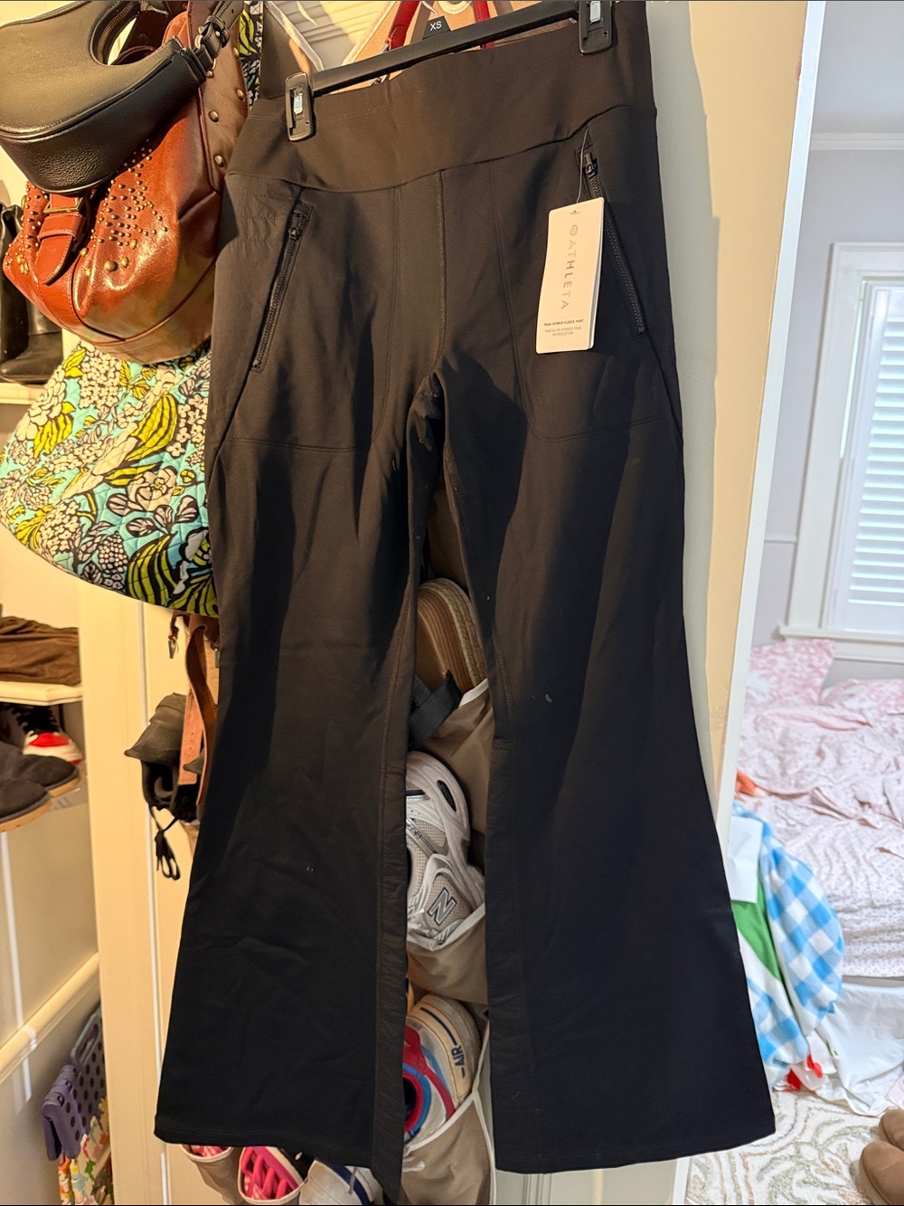 Athleta Black Flared Active Leggings with Zip Pocket